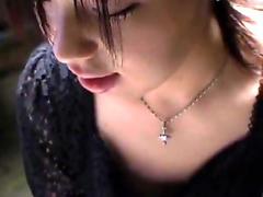 Cool Asian babe talks with a stranger, who films her bra