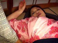 MILF in a geisha robe gives her man a great blowjob